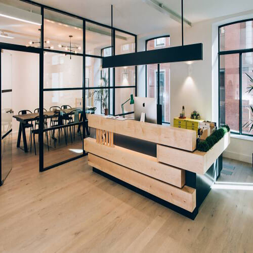 Thi công đá nhân tạo solid surface làm quầy lễ tân- công ty Belfast